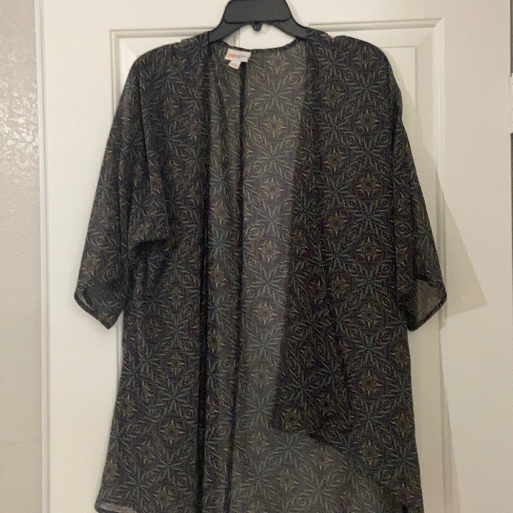 Beautiful multi color cover. LuLaRoe small great for all occasions